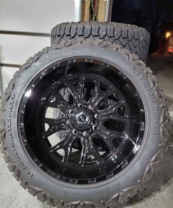 22x12 tis 560b wheels wrapped in venom hunter+ 35x12.50-22. 8x170